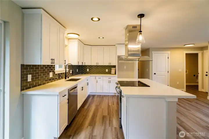 TONS OF COUNTER SPACE AND EVEN A SMALL PANTRY BEHIND FRIDGE SPACE