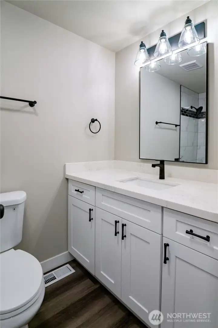 MAIN BATH GRANITE VANITY AND SOFT CLOSE CABINETS