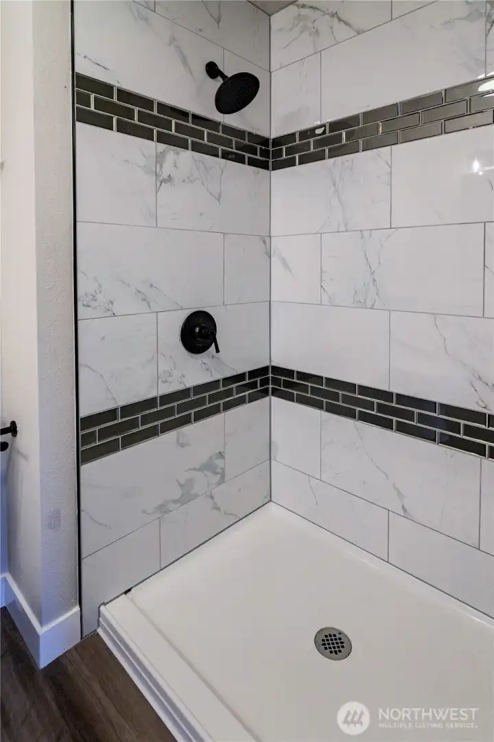 PRIMARY SHOWER WITH TILE SURROUND...AND GOOD SIZED TOO!