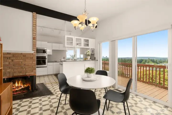 Imagine a cozy dining area with a charming wood-burning fireplace, offering warmth and ambiance. Large windows showcase sweeping views, letting in natural light. It's an inviting spot for meals, gatherings, and enjoying nature's beauty year-round. Imagine a cozy dining area with a charming wood-burning fireplace, offering warmth and ambiance. Large windows showcase sweeping views, letting in natural light. It's an inviting spot for meals, gatherings, and enjoying nature's beauty year-round.