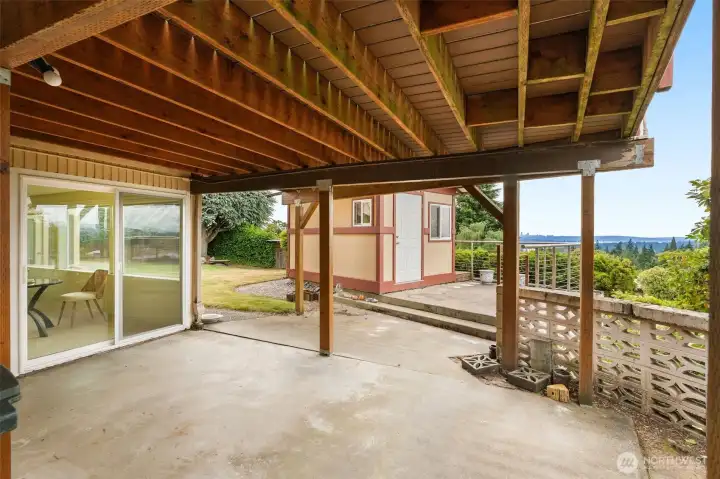 Patio leads to the Japanese-inspired tea house with sweeping views. Patio leads to the Japanese-inspired tea house with sweeping views.