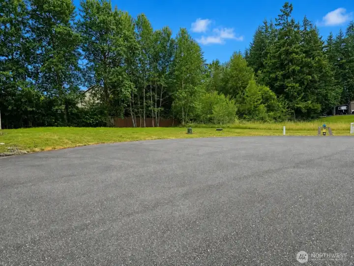 The neighboring green space adds to the appeal of this home-site, creating a comfortable buffer and attractive setting.