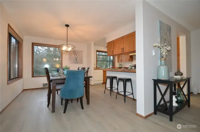Dining space with windows to experience the view while dining plus room for bar stools for extra seating
