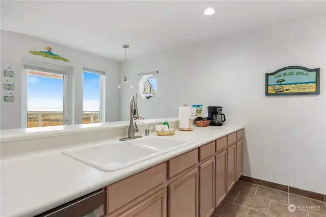 View from the kitchen to the ocean and dunes