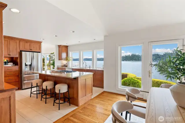 Remodeled chef’s kitchen with spacious walk-in pantry and 5-burner gas range.