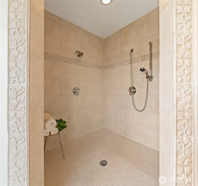 Walk-in shower in primary bath.