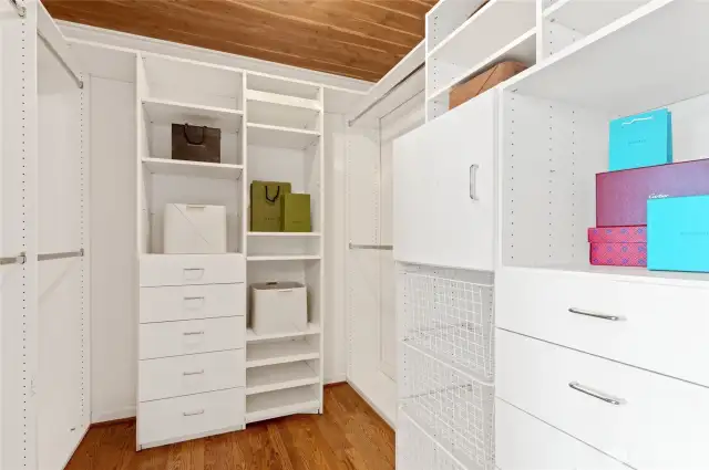 Walk-in closet with built-ins.