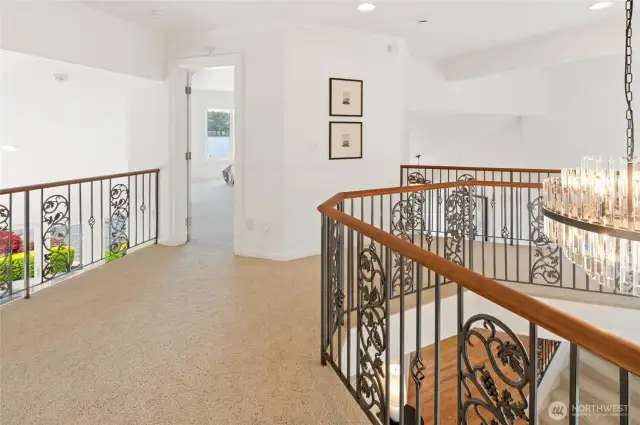 Open layout leading to upper floor bedrooms.
