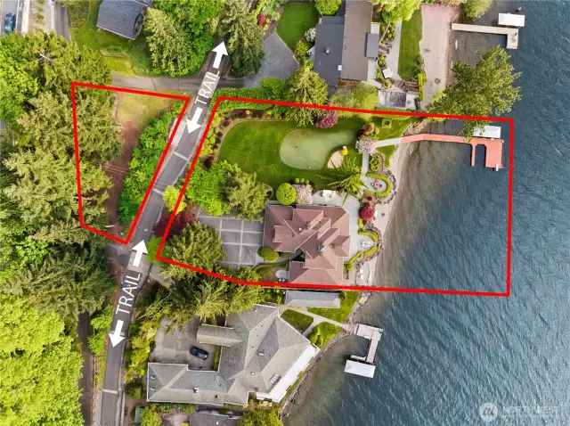 Spectacular street to waterfront leveled grounds and steps to walking trail.