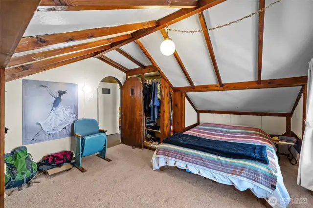 Bedroom #1 upper, check out the cool woodwork and door!