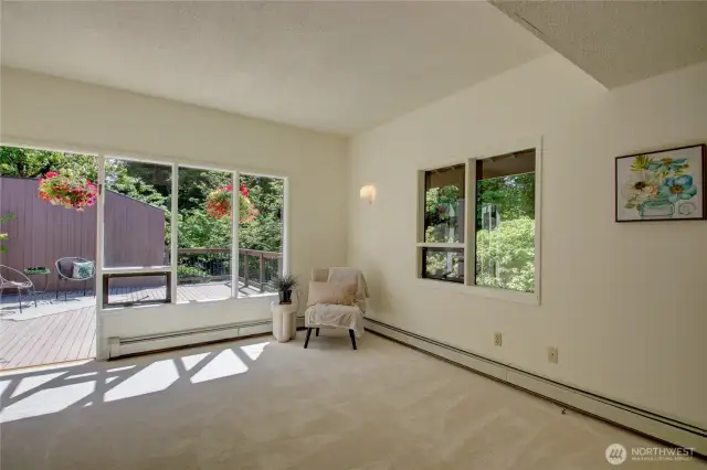 Primary bedroom open up to large private deck to enjoy your morning coffee!