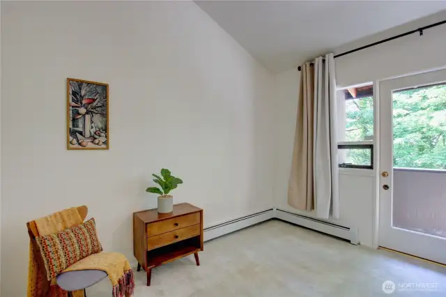 Upper bedroom with small balcony.