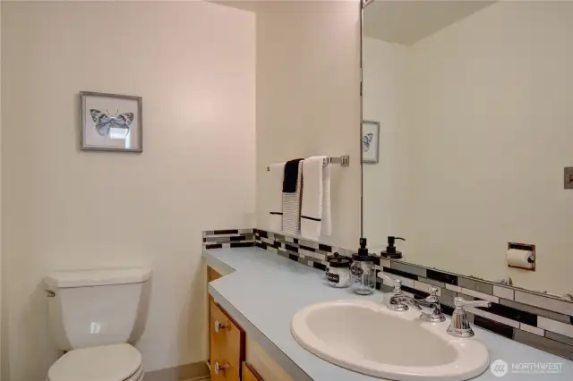 Half bath at the end of the hall.