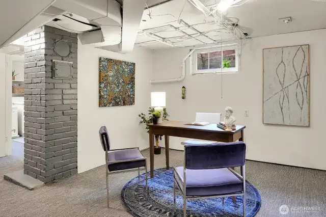 The office area has good ceiling height and new carpet.