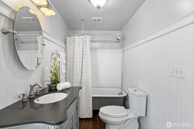 Main floor bathroom showing clawfoot tub/shower.
