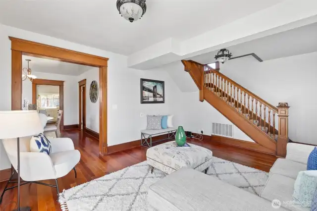Living room looking toward open stairway to upper level.