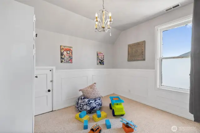 Secondary bedroom #1 with free-standing closet.