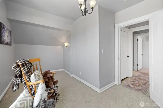 Secondary bedroom #2 looking toward hallway.  Not shown on the right is the doorway to the bedroom closet.