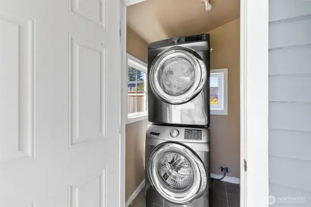 Full size washer and dryer in laundry room off back porch.
