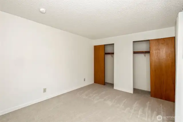 Primary bedroom has two closets