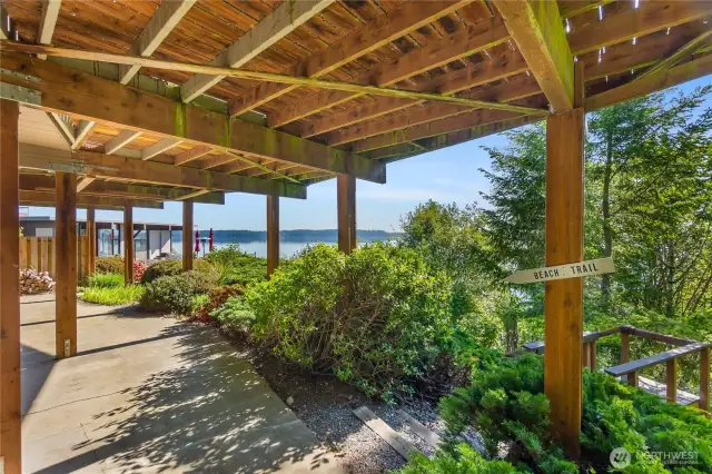 Even the lower level patio has incredible water views and your own private trail to the community beach. This home is the only property in the Beachcrest community that has direct access to the beach.