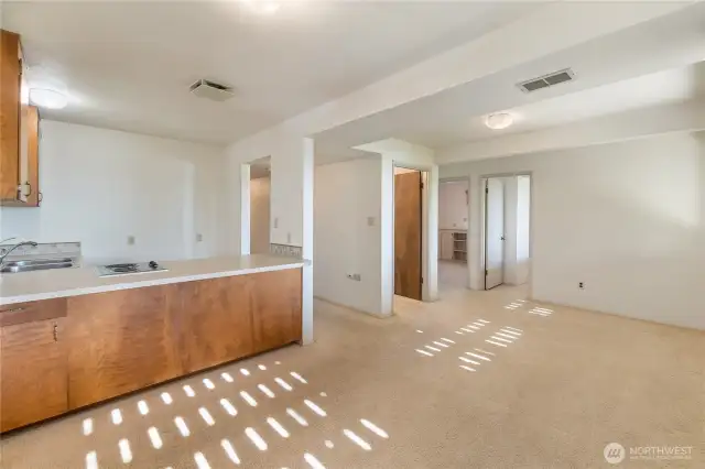 The lower level offers a kitchenette, full bath, two bedrooms and a living area.