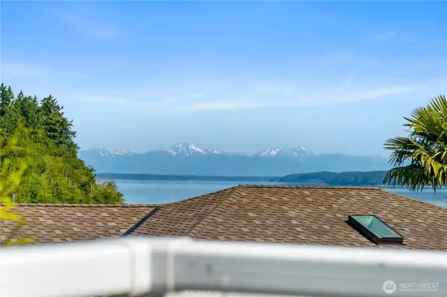 Stellar views of the Olympic mountains can be seen from inside and outside the home.