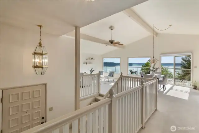 The minute you enter the home and reach the top of the stairs you will be mesmerized by the amazing water & mountain vistas that are awaiting you.