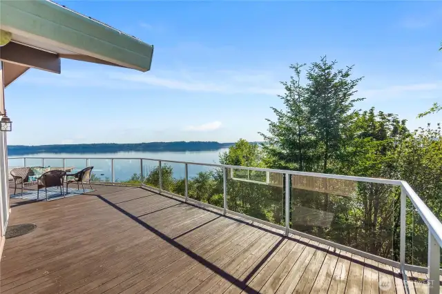 Another view of the incredible outdoor scenery from the vantage point of your own deck.  Dining al fresco has never been more satisfying.
