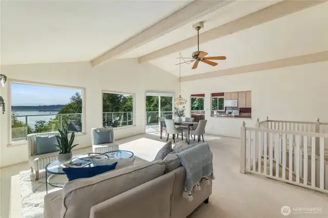 Great room is made for entertaining.  Stairs lead to the entry and then to the self-sufficient lower level of the home.