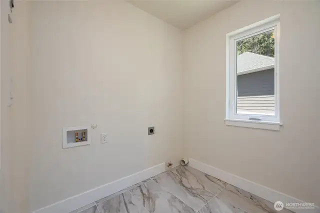 Laundry room upstairs for simplified living