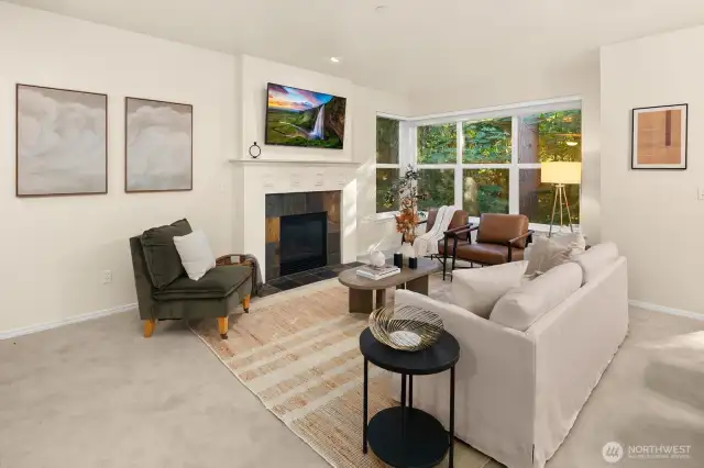 Open living room, dining room, kitchen- opening to private back patio & yard space