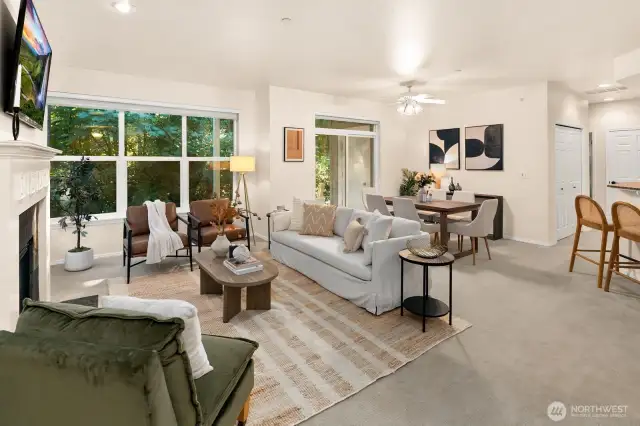 Open living room, dining room, kitchen- opening to private back patio & yard space