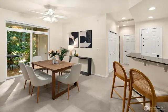 Open living room, dining room, kitchen- opening to private back patio & yard space