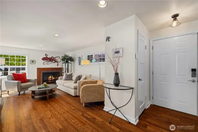 Gleaming hardwoods throughout the entire main level. One of two wood burning fireplaces.