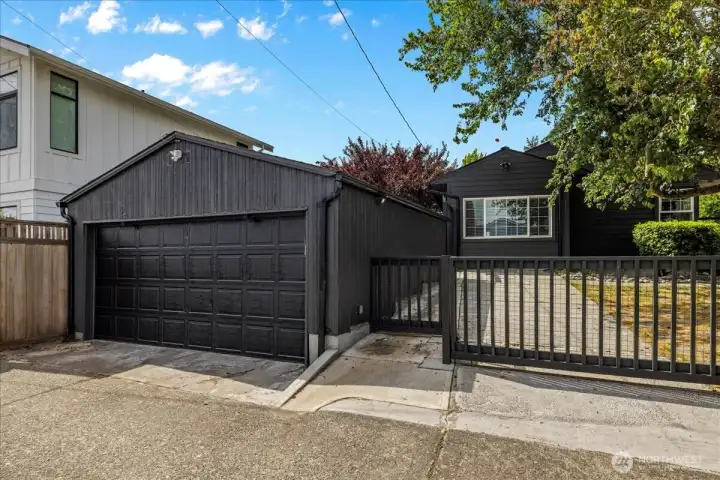 2 car garage with alley access. DADU potential (Buyer to verify)