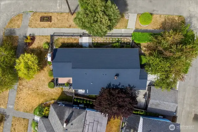 Big corner lot with parking galore, an attached 2 car garage off the alley