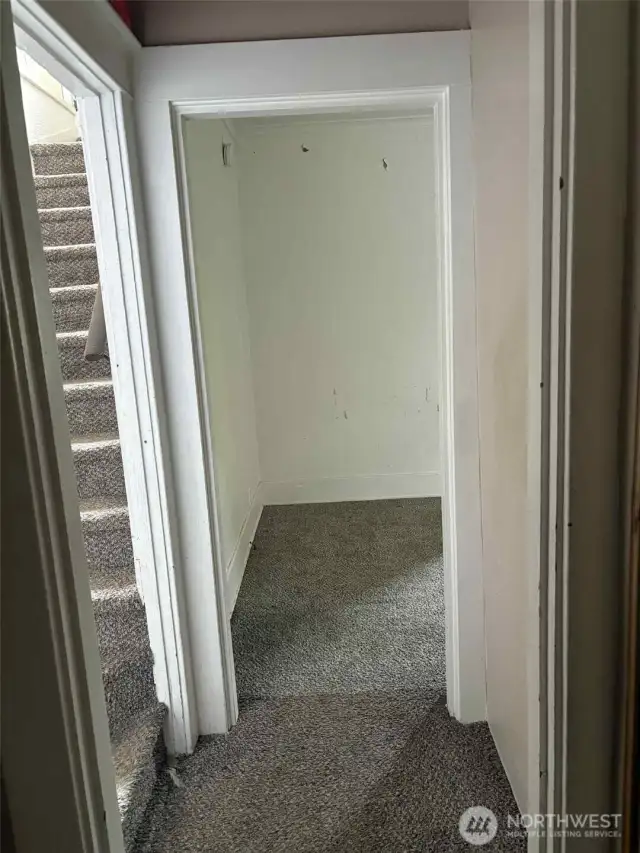 Back bedroom straight ahead, left is the stairs to the loft and two more bedrooms.