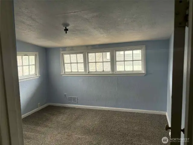 Second upstairs bedroom with so much charm!