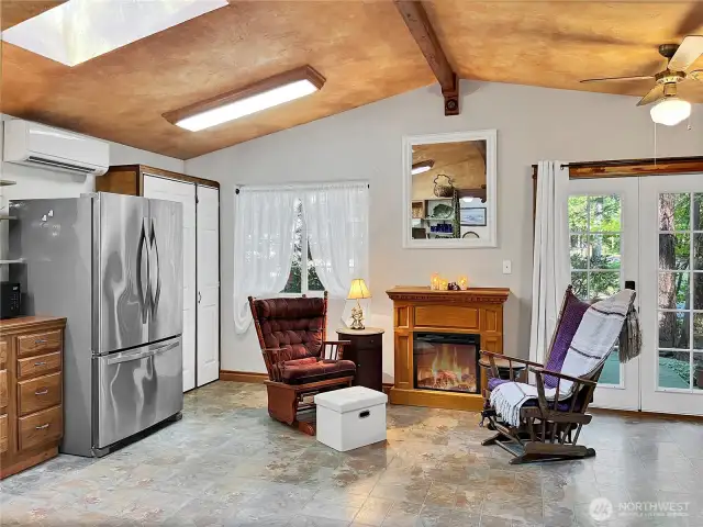 Enjoy the glow and warmth of this energy-efficient electric fireplace.
