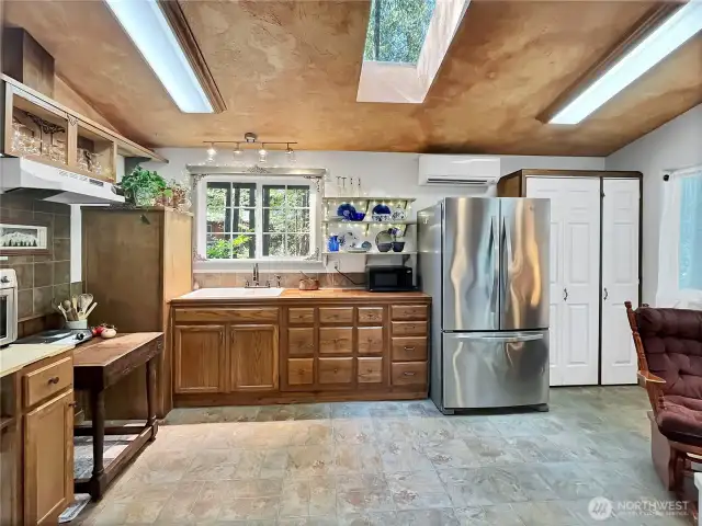Modern French door fridge paired with a well-organized pantry for all your essentials