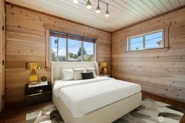 Main Level Cedar Bedroom with generous closet space & radiant tile floors. Virtually staged to show the possibilities!