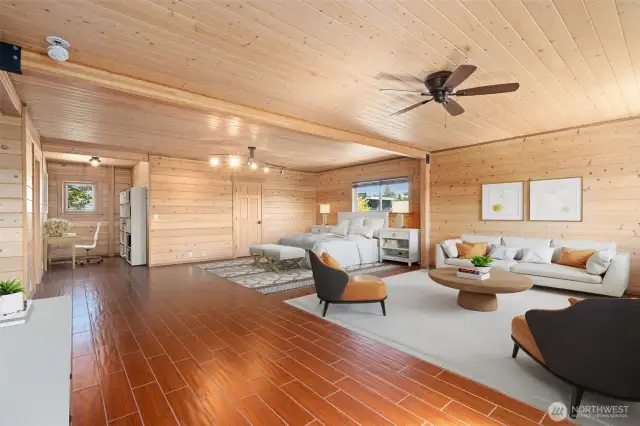 Grand Primary Suite on 2nd Level - Cedar walls & ceilings, radiant tile floors, large walk in closet, full bathroom, deck to views and work space! Virtually staged to show the possibilities!