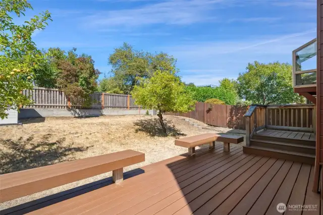 Backyard with newer deck off kitchen - fenced with small storage shed. Easy access from the house or the front yard.