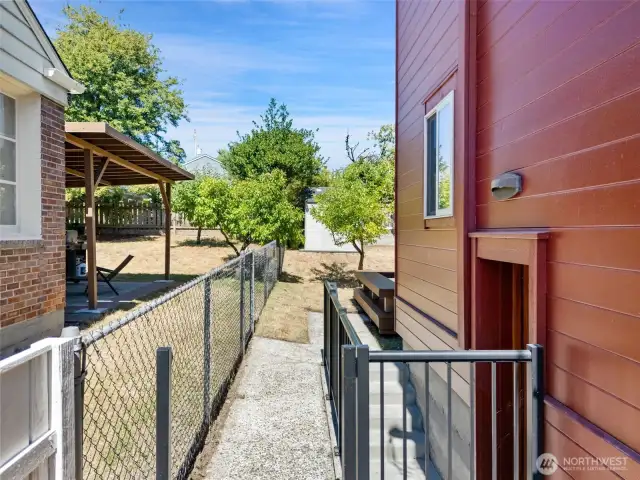 Side yard easily accessed from the front yard or side door of the home.