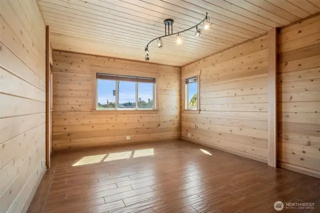 Upper level bedroom - views of Green Lake & the City - shown here without the virtual staging in place.