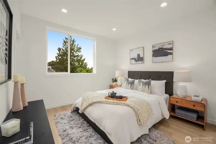 Tucked above it all, this airy upper-level room offers quiet, privacy, and just the right touch of sunlight.