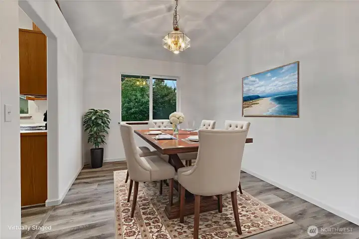 Formal dining area; virtually staged.
