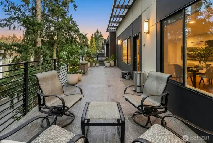 Welcome to The Lofts at 15th where you can enjoy a full-width, ultra-private deck just off the kitchen—perfect for entertaining, container gardening, or relaxing outdoors.