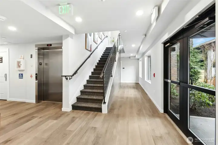 Private attached two-car garage with stair and elevator access directly to the home.